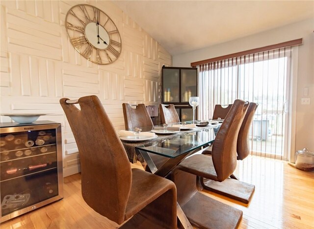 10 Flanders St, Johnston, RI 02919 - dining room with wood finished floors, vaulted ceiling, and beverage cooler