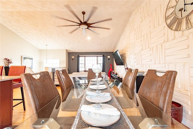 10 Flanders St, Johnston, RI 02919 - dining space with lofted ceiling, a ceiling fan, and light wood-style flooring
