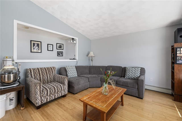2 Sando St, Pawtucket, RI 02860 - living room featuring lofted ceiling, a baseboard radiator, and wood finished floors
