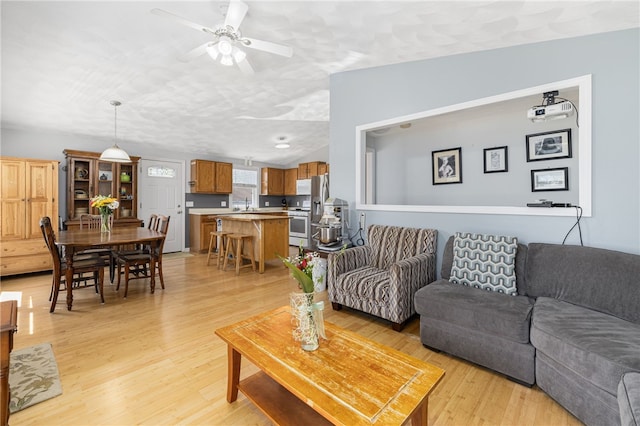 2 Sando St, Pawtucket, RI 02860 - living room with light wood-type flooring and ceiling fan