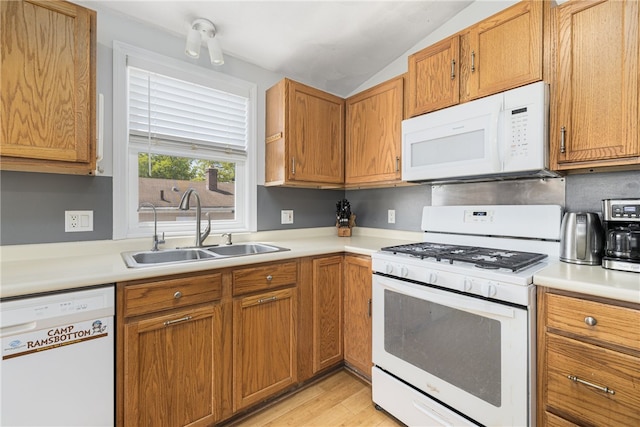 2 Sando St, Pawtucket, RI 02860 - kitchen featuring white appliances, a sink, lofted ceiling, and light countertops