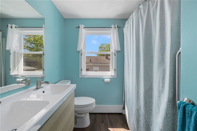 2 Sando St, Pawtucket, RI 02860 - full bathroom featuring baseboards, wood finished floors, toilet, and double vanity