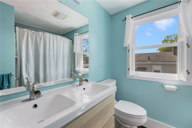 2 Sando St, Pawtucket, RI 02860 - bathroom with toilet, baseboard heating, double vanity, and curtained shower