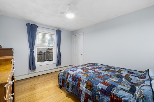 2 Sando St, Pawtucket, RI 02860 - bedroom with a baseboard radiator and light wood-style flooring