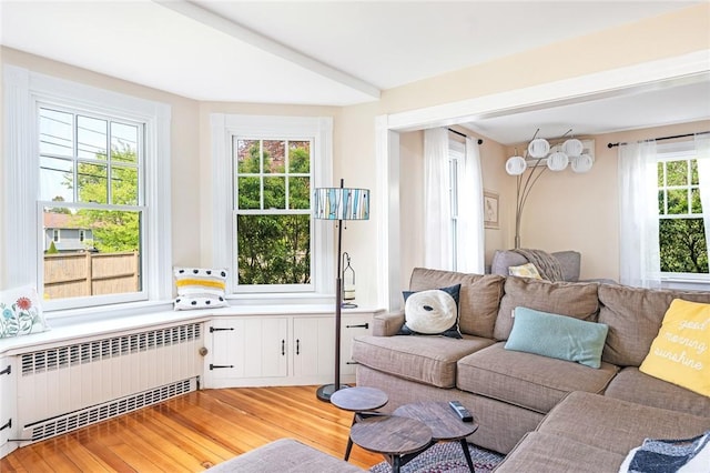 286 Kingstown Rd, Narragansett, RI 02882 - living area featuring radiator and light wood finished floors