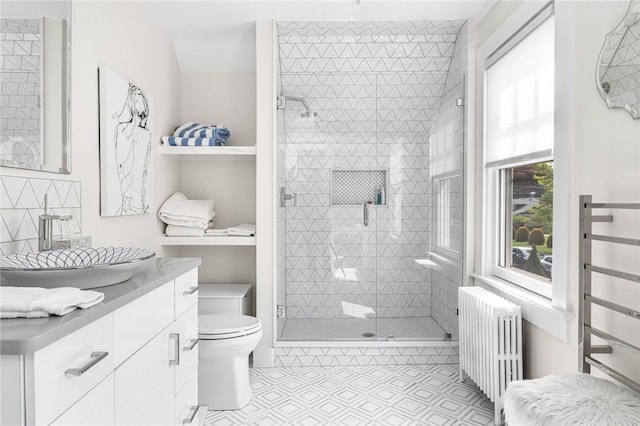 286 Kingstown Rd, Narragansett, RI 02882 - full bath featuring radiator heating unit, toilet, a stall shower, and vanity