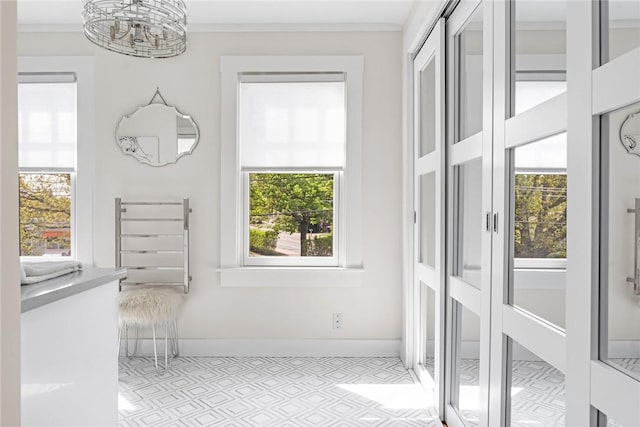 286 Kingstown Rd, Narragansett, RI 02882 - unfurnished sunroom featuring a chandelier