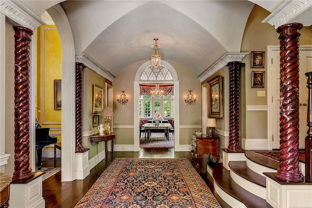 14 Leroy Ave, Newport, RI 02840 - entryway with arched walkways, wood finished floors, vaulted ceiling, ornate columns, and a chandelier
