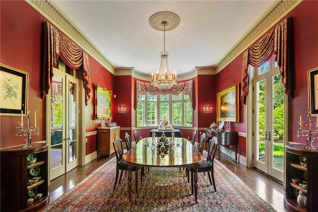 14 Leroy Ave, Newport, RI 02840 - dining space with french doors, plenty of natural light, wood finished floors, and ornamental molding