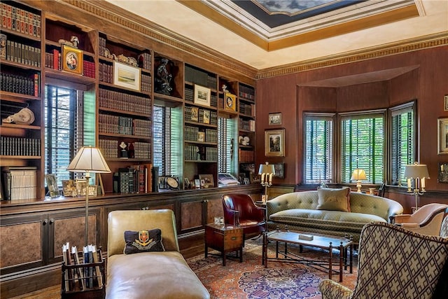 14 Leroy Ave, Newport, RI 02840 - sitting room featuring crown molding, built in shelves, and wood finished floors