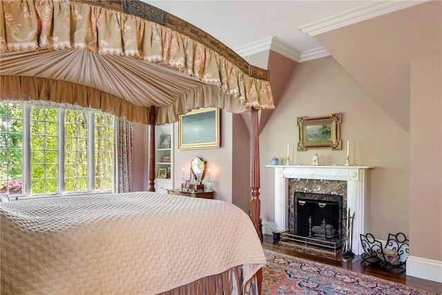 14 Leroy Ave, Newport, RI 02840 - bedroom with wood finished floors, crown molding, and a high end fireplace