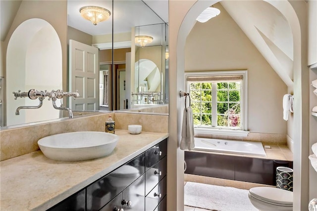14 Leroy Ave, Newport, RI 02840 - bathroom with a garden tub, vanity, and vaulted ceiling