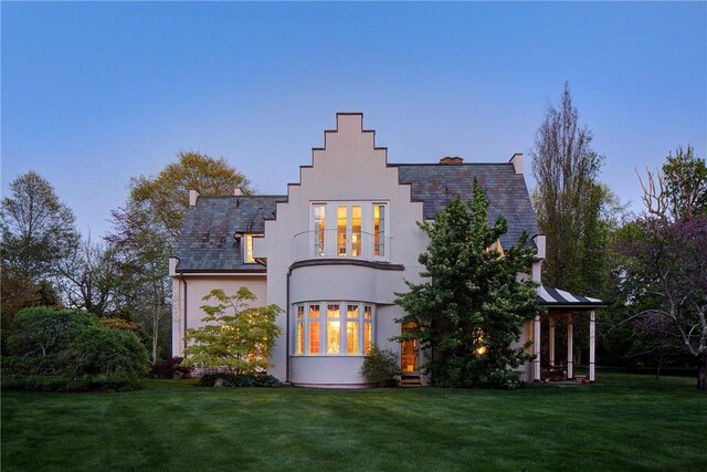 14 Leroy Ave, Newport, RI 02840 - rear view of house featuring a yard, french doors, and stucco siding