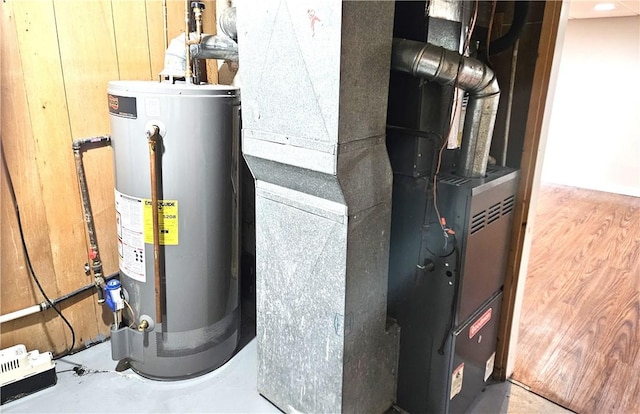 utility room featuring gas water heater