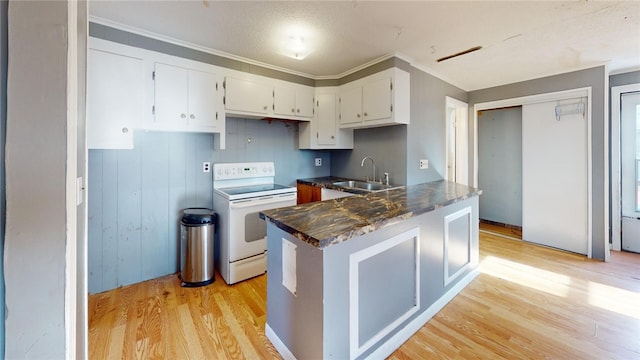 226 Marshall Ave, Cumberland, RI 02864 - kitchen featuring white electric range oven, a sink, light wood-style floors, white cabinets, and crown molding