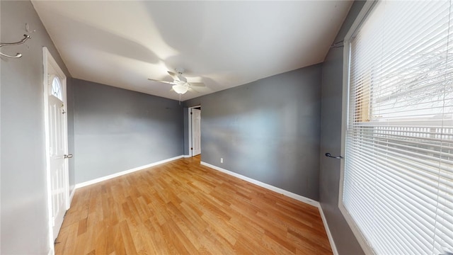 226 Marshall Ave, Cumberland, RI 02864 - spare room featuring a ceiling fan, light wood-type flooring, and baseboards