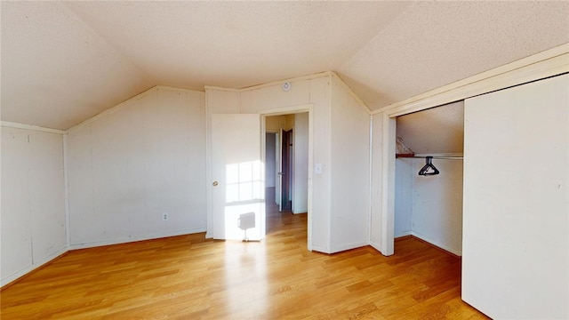 226 Marshall Ave, Cumberland, RI 02864 - bonus room with lofted ceiling, light wood finished floors, a textured ceiling, and baseboards