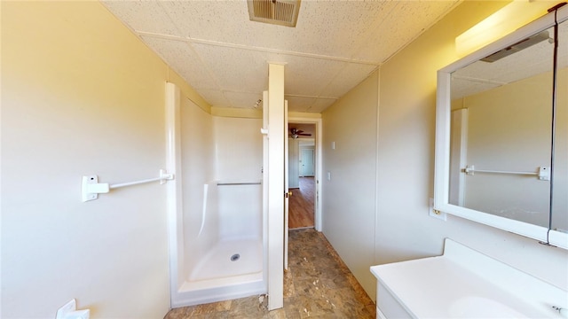 226 Marshall Ave, Cumberland, RI 02864 - bathroom with a stall shower, vanity, and a drop ceiling