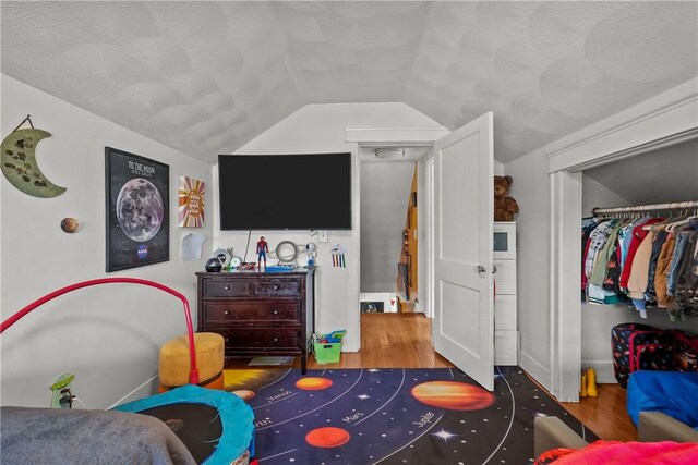 54 Delway Rd, East Providence, RI 02914 - bedroom featuring wood finished floors, lofted ceiling, and a closet