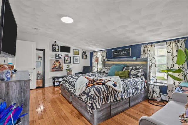54 Delway Rd, East Providence, RI 02914 - bedroom featuring vaulted ceiling, wood-type flooring, and baseboards