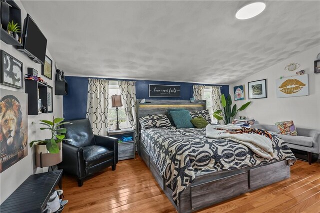 54 Delway Rd, East Providence, RI 02914 - bedroom with hardwood / wood-style floors, multiple windows, and lofted ceiling
