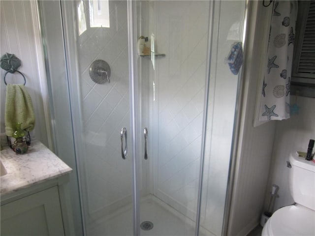 0 Beach Rd, Portsmouth, RI 02871 - bathroom with vanity, a shower stall, and toilet