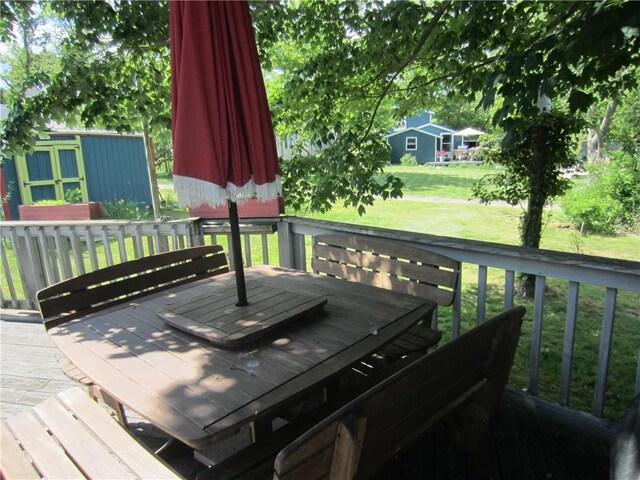 0 Beach Rd, Portsmouth, RI 02871 - wooden deck with a yard, an outdoor structure, and a storage unit