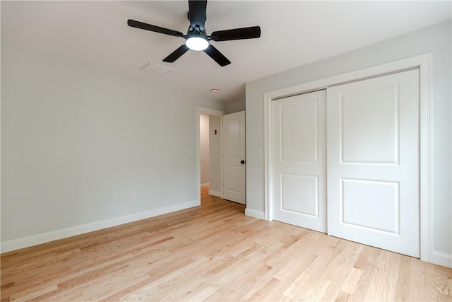300 Tower Hill Rd, Cumberland, RI 02864 - unfurnished bedroom with baseboards, light wood-style flooring, a closet, and a ceiling fan