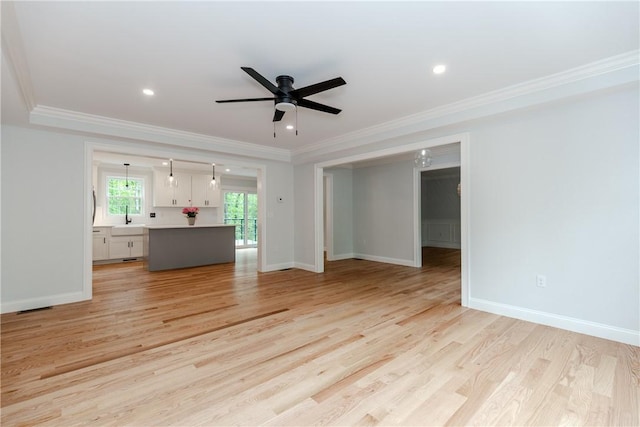 300 Tower Hill Rd, Cumberland, RI 02864 - unfurnished living room featuring ceiling fan, a sink, ornamental molding, light wood-style floors, and baseboards
