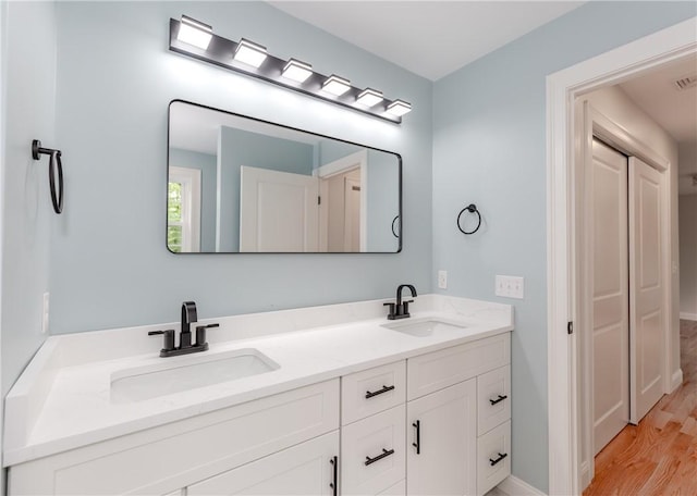300 Tower Hill Rd, Cumberland, RI 02864 - full bath featuring double vanity and wood finished floors
