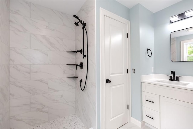 300 Tower Hill Rd, Cumberland, RI 02864 - bathroom with a marble finish shower, vanity, and marble look tile flooring