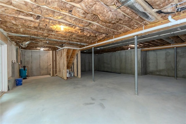 300 Tower Hill Rd, Cumberland, RI 02864 - unfinished below grade area with a water pressure tank