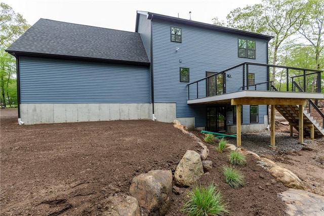 300 Tower Hill Rd, Cumberland, RI 02864 - rear view of house with stairway, a wooden deck, and a shingled roof