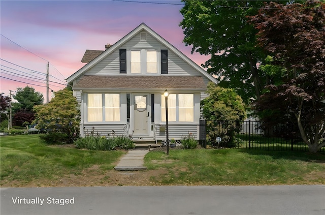 bungalow-style home with a chimney