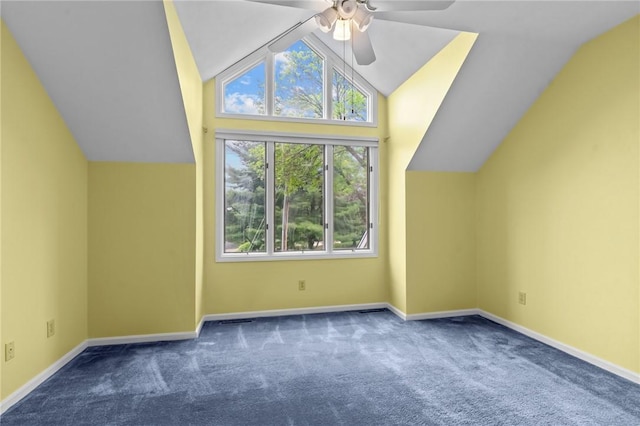 additional living space featuring carpet floors, ceiling fan, vaulted ceiling, and baseboards