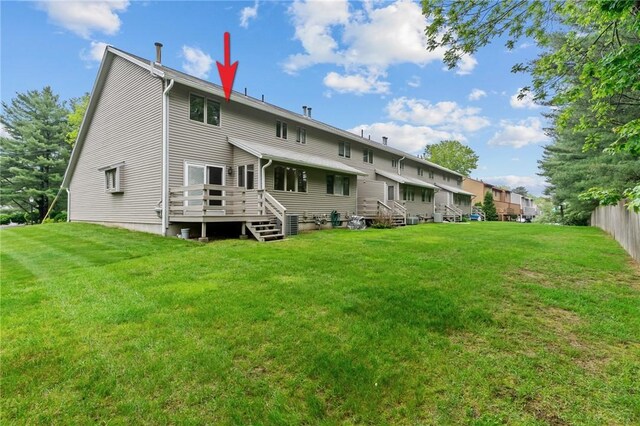 rear view of property with a deck