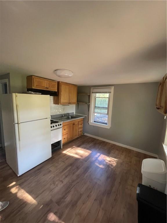 8 Aldrich St, Hopkinton, RI 02898 - kitchen with freestanding refrigerator, dark wood-style flooring, baseboards, and open shelves