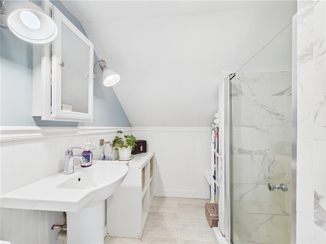 39 Union St, East Greenwich, RI 02818 - bathroom with a shower stall, wood finished floors, wainscoting, and vaulted ceiling