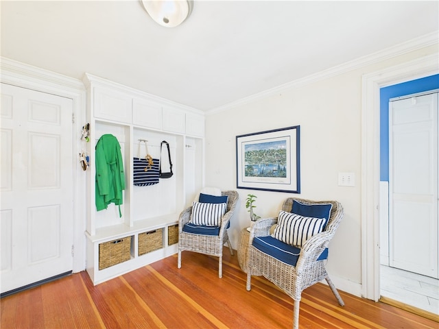 39 Union St, East Greenwich, RI 02818 - living area featuring light wood-style flooring, ornamental molding, and baseboards