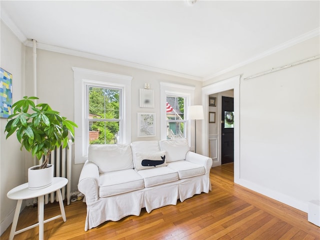 39 Union St, East Greenwich, RI 02818 - sitting room with light wood finished floors and ornamental molding