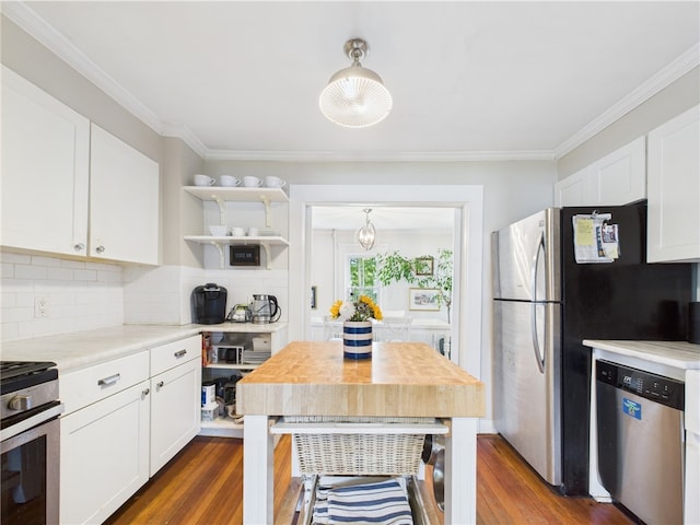 39 Union St, East Greenwich, RI 02818 - kitchen featuring stainless steel appliances, dark wood-style floors, white cabinets, light countertops, and backsplash
