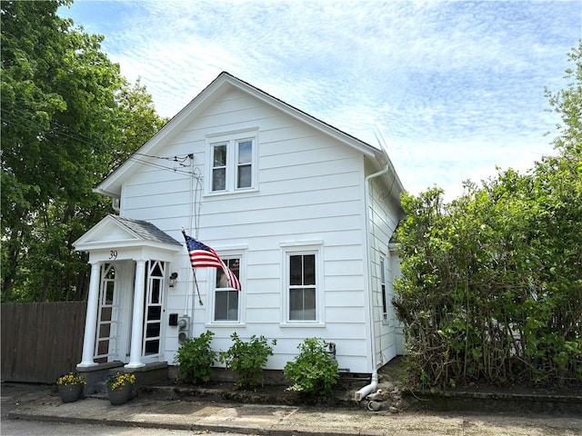 39 Union St, East Greenwich, RI 02818 - view of front of home featuring fence