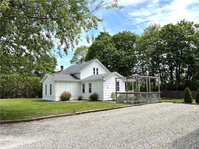 39 Union St, East Greenwich, RI 02818 - view of side of home with a pergola, a shingled roof, and a chimney