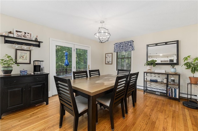 31 Corey Trl, Richmond, RI 02898 - dining area featuring plenty of natural light, light wood-type flooring, and a chandelier