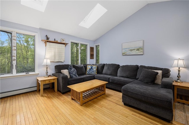 31 Corey Trl, Richmond, RI 02898 - living area with a skylight, light wood-style floors, high vaulted ceiling, and baseboard heating
