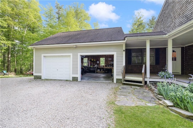 31 Corey Trl, Richmond, RI 02898 - garage featuring driveway and a porch