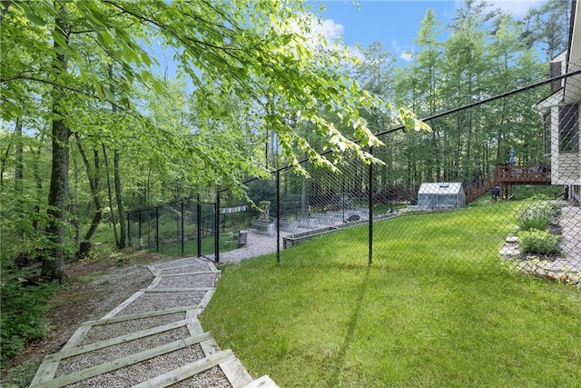 31 Corey Trl, Richmond, RI 02898 - view of yard featuring a storage shed, an outdoor structure, and a deck
