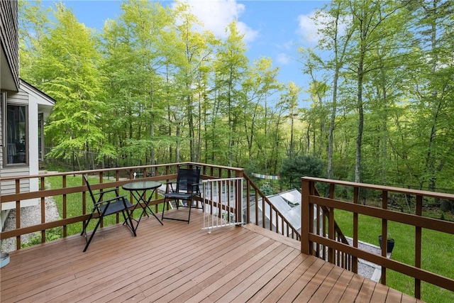 31 Corey Trl, Richmond, RI 02898 - wooden terrace with a forest view