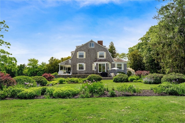 125 Sakonnet Point Rd, Little Compton, RI 02837 - rear view of house featuring a gambrel roof, a yard, and a chimney