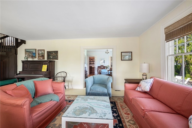 125 Sakonnet Point Rd, Little Compton, RI 02837 - living area with stairs, baseboard heating, and baseboards